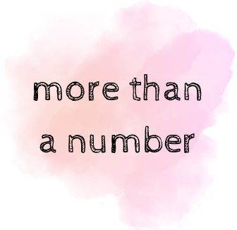 A pink-and-orange watercolor gradient, with the text `More Than A Number` written over top.